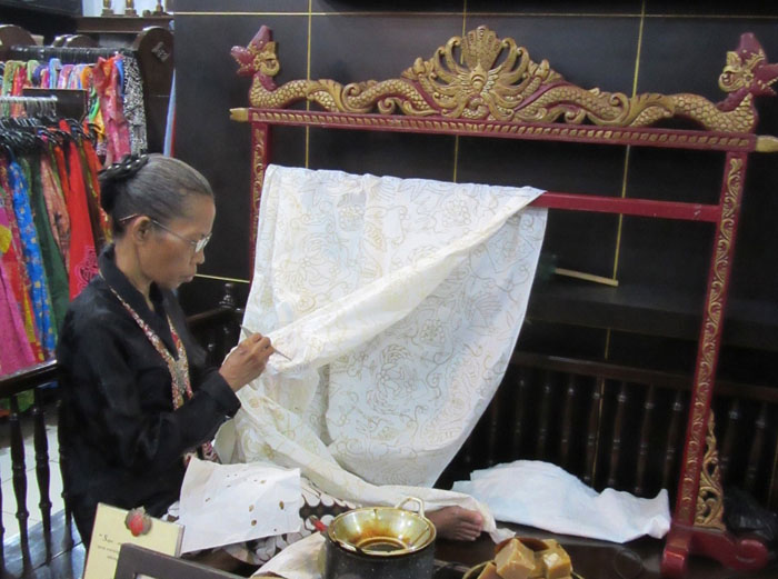 batik artist at batik market in Jogjakarta, Indonesia