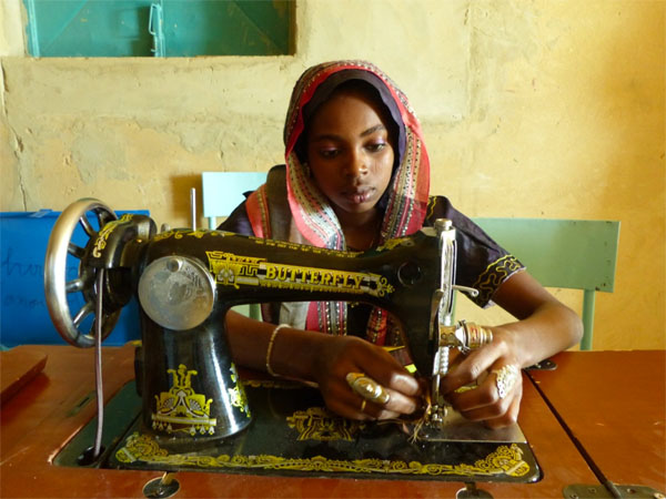 Halima Ousseïni’s prospects have grown vastly thanks to some new skills and a humble sewing machine. (UNDP)