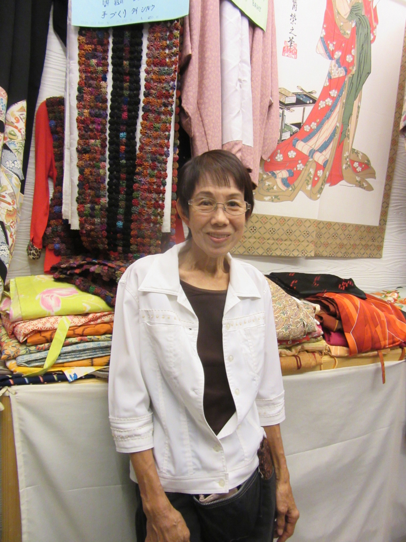 quilter/fabric vendor at Chatuchak Market in Bangkok, Thailand