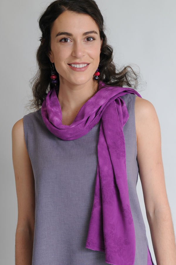 The Fuchsia Silk Scarf generates a burst of floral color.