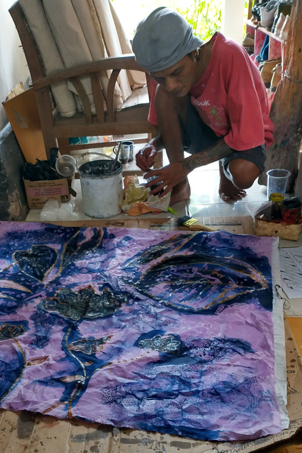 My batik instructor, Hananta Nur, adding layers of wax and dye to our collaboration.