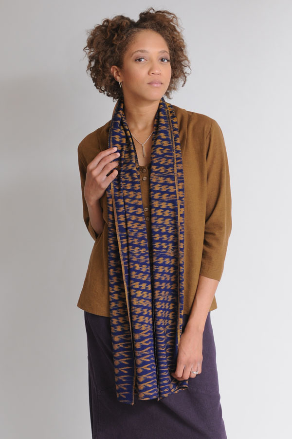 A Toffee Princess Top is paired with a handwoven Blue/Toffee Ikat Scarf. 