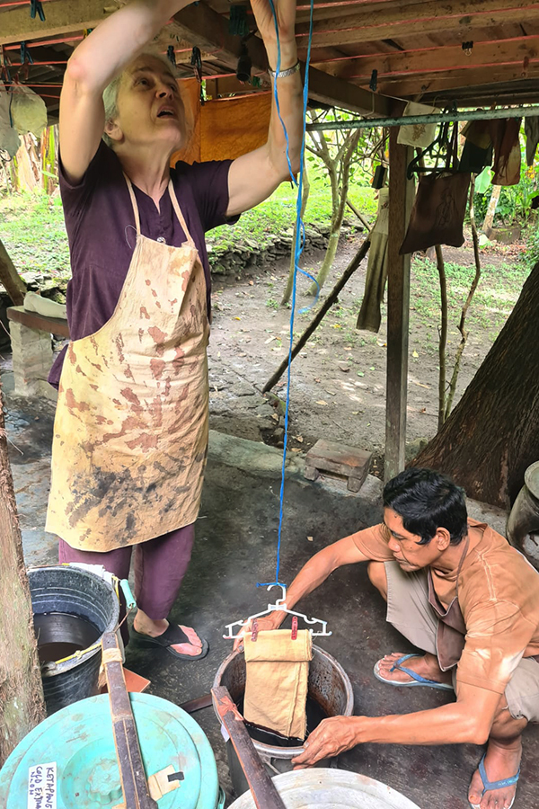 Learning through doing in natural dyer, Dedi's outdoor workspace in Yogyakarta