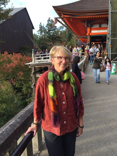 Jane’s Paprika Tuxedo Top accessorized with some well-chosen scarves served her well on a recent Japanese trip. 