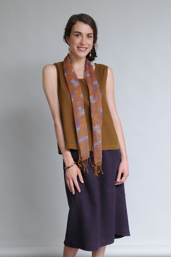 The Rust, Purple & Grey Silk Scarf accessorizes beautifully with earth tones.