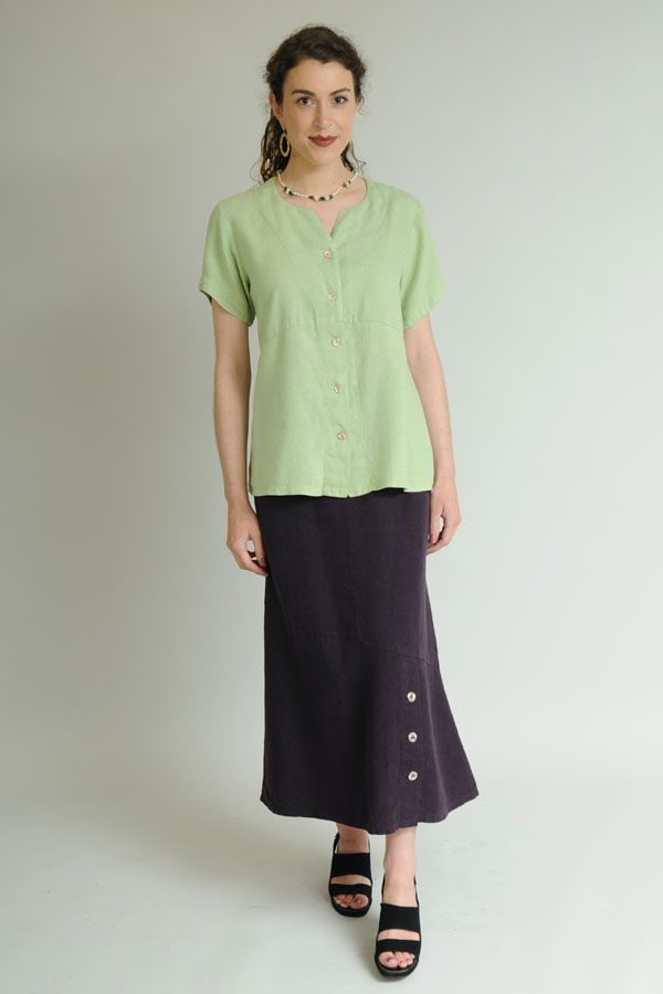 Swallowtail Top in Green Tea over an Angled Skirt in Plum.